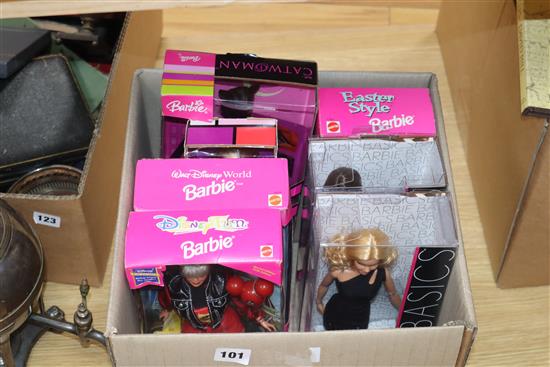 A collection of nine Barbie dolls including Barbie basics